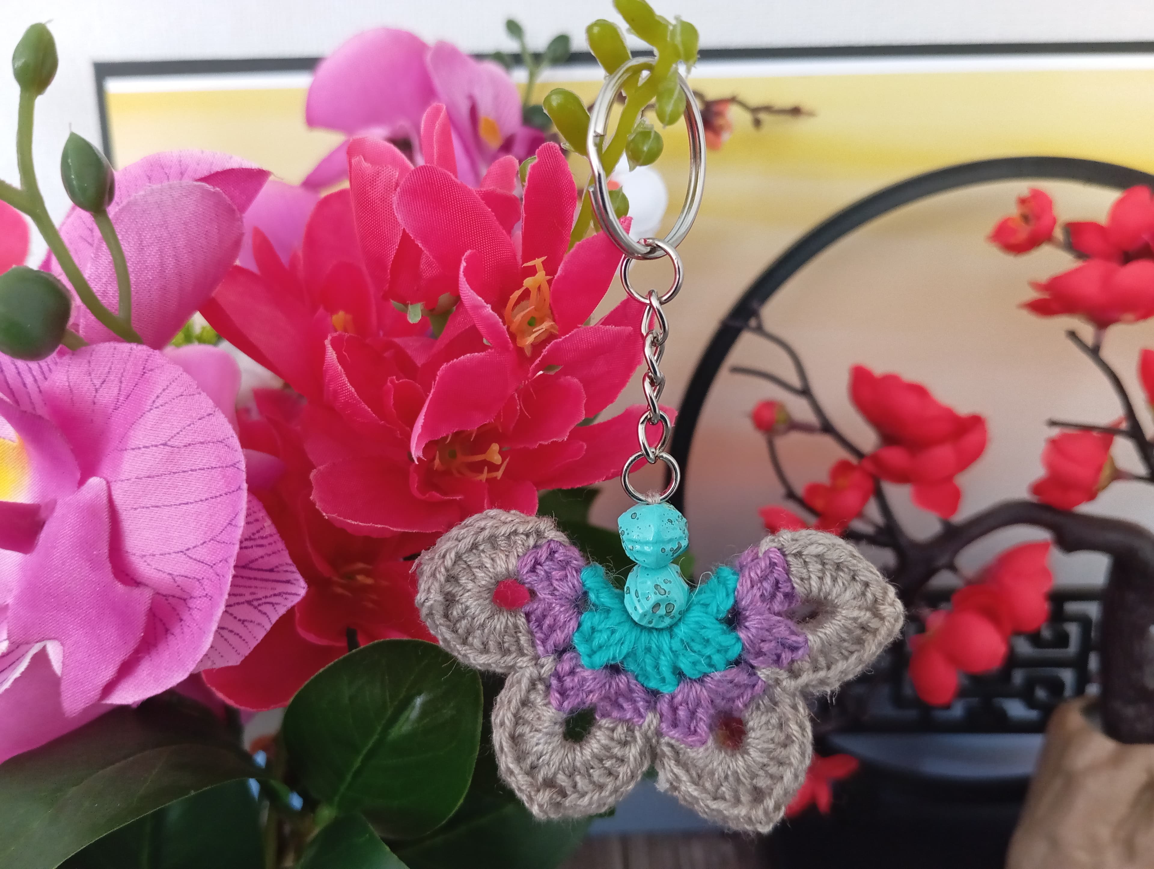 Porte clé papillon marron/violet/bleu